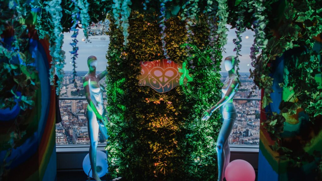 1960s themed event entrance; colourful archway with retro TV props.