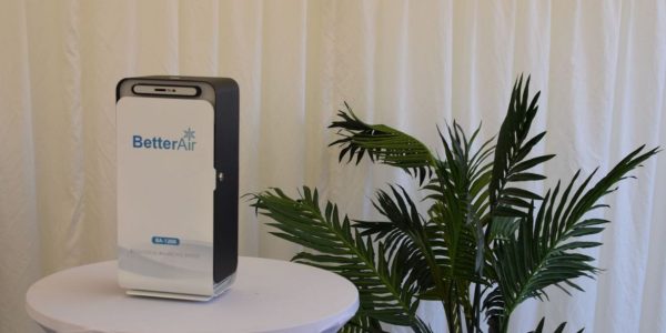 Better Event Air Cleaning Air machine for covid safe events on top of a table at an event site