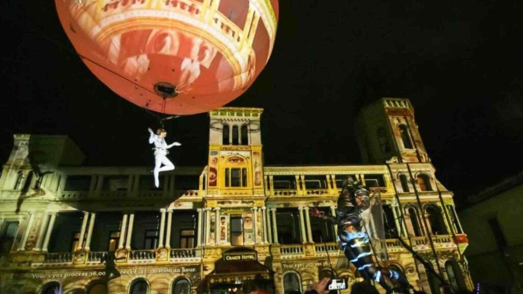 Aerial balloon arena show with high-end staging, lighting and audiovisual set up.