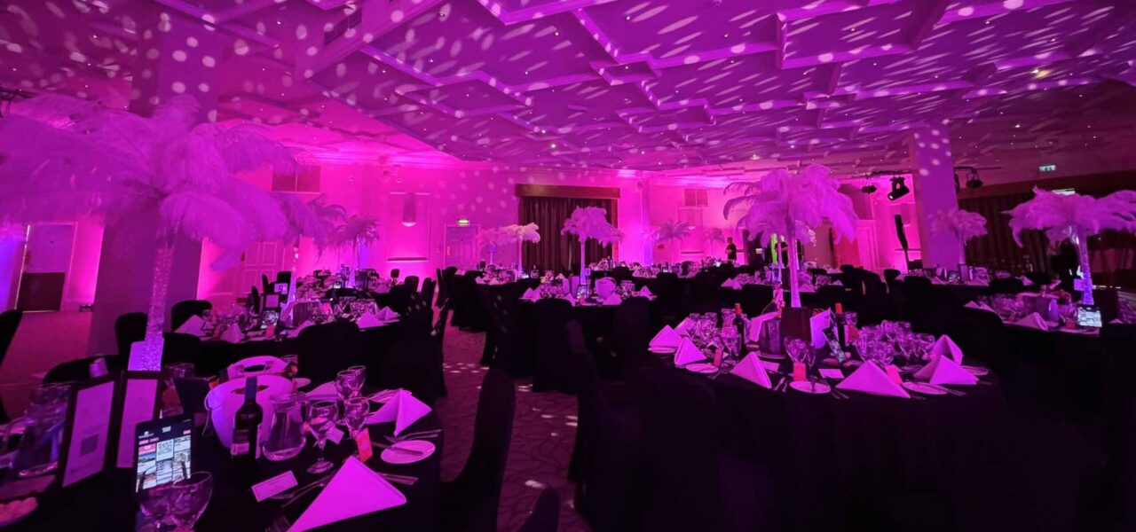 For our client Barratt Homes we overhauled the space with luxury dark linen, feather centrepieces and stunning lighting.