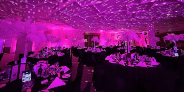 For our client Barratt Homes we overhauled the space with luxury dark linen, feather centrepieces and stunning lighting.