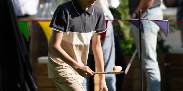 Child-Racing-With-Egg-And-Spoon