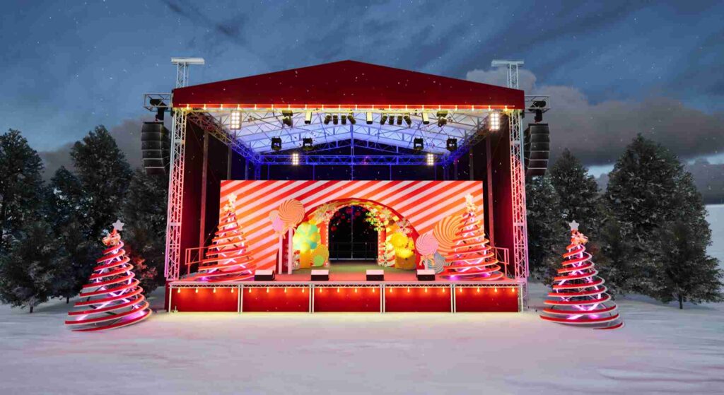 Christmas set and stage design with red and white striped backdrop, festive props and ambient lighting in a snowy setting.