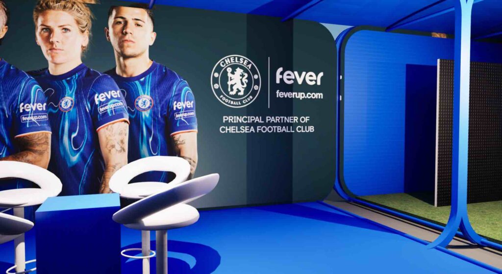 A football branded interior of a fan park installation with blue decor.