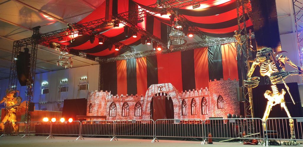 Giant stage, props, venue draping and lighting and AV booked for Saudi Arabia Horror Festival event production.