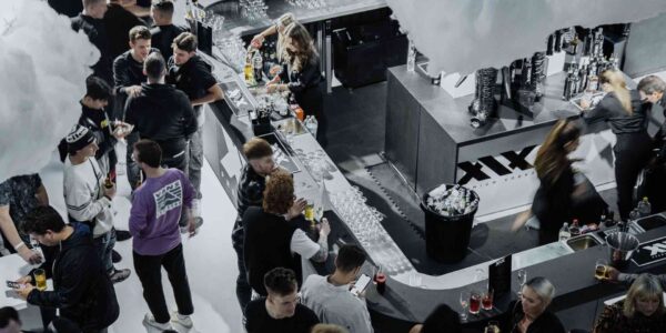 Guests-Conversing-At-XIX-Product-Launch-Event