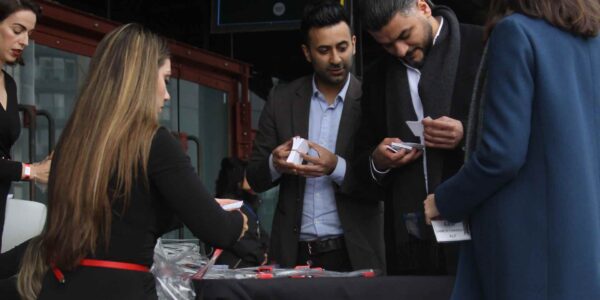 Guests-Looking-At-Free-Samples-At-Product-Launch-Event
