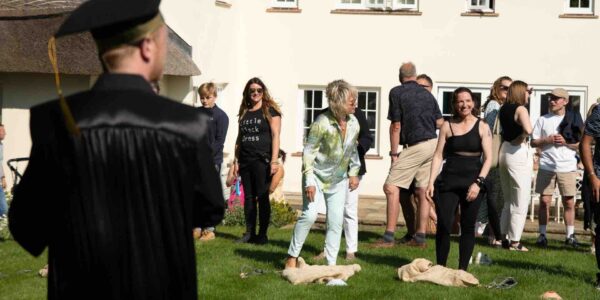 Guests-Preparing-To-Take-Part-In-Sack-Race