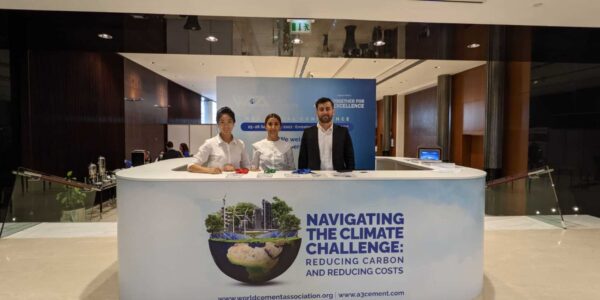 Friendly staff greeting delegates at this conference exhibition stand in Dubai for the world health climate.