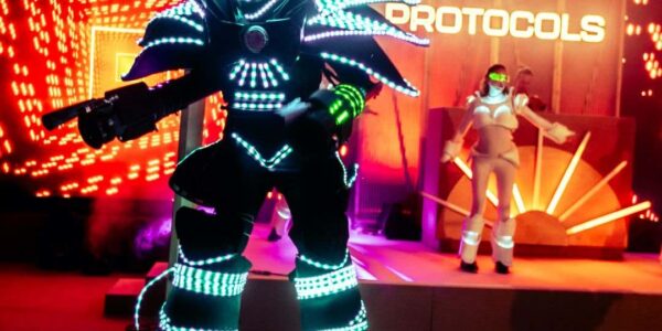 LED robot dancers entertaining guests at a corporate fun day event on Magna Carta Island, London.