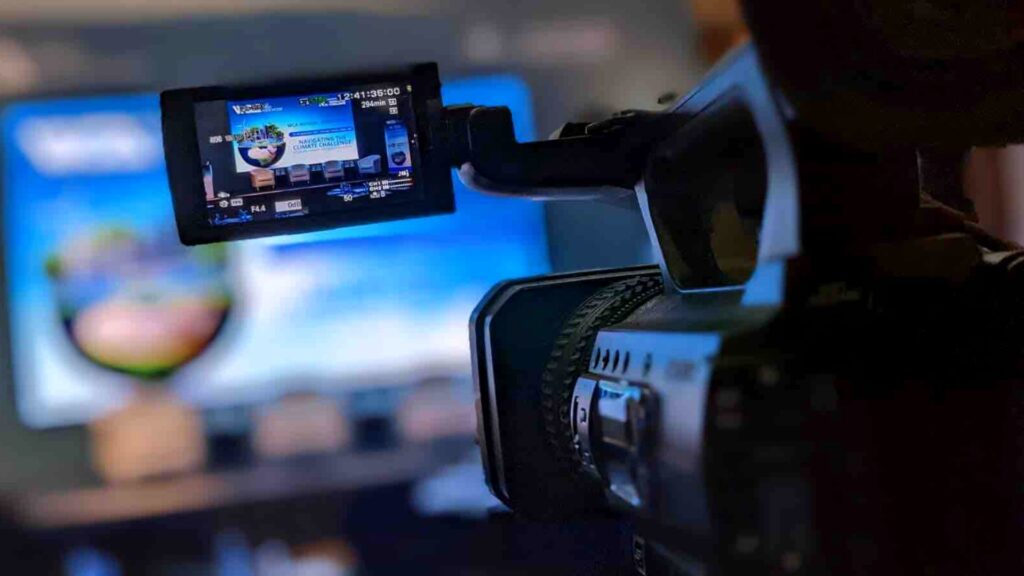 WCA conference event being live streamed through camera.