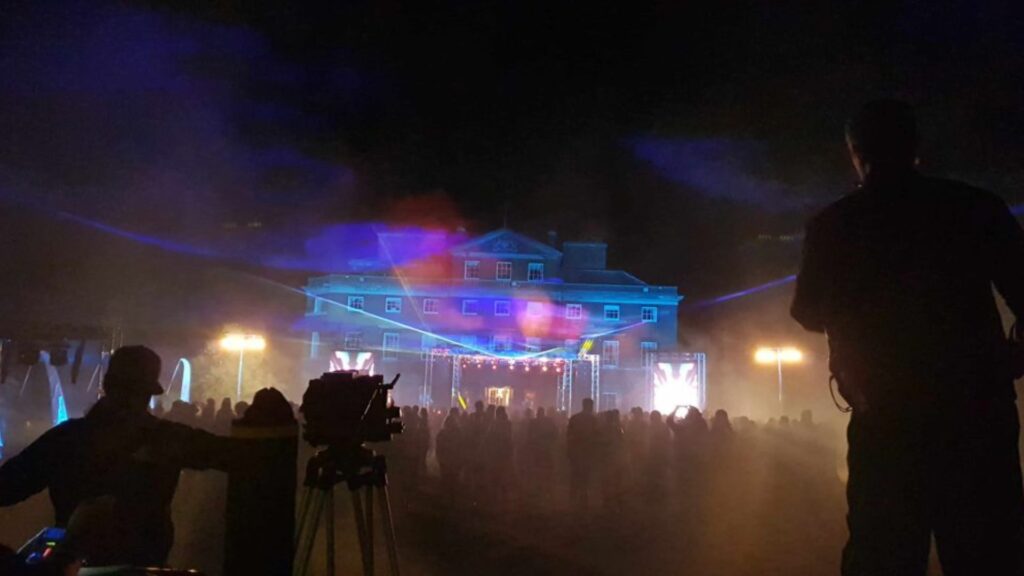 Netflix 'Turn Up Charlie' special night festival scene.