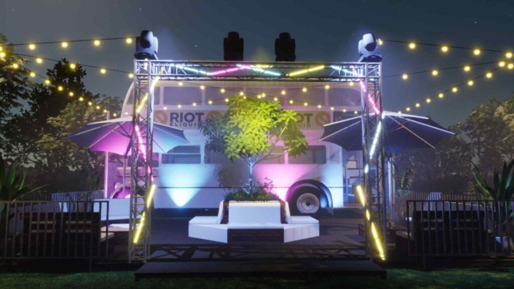 Riot Squad 'Riot Rehab Bus' Brand Activation with green, blue and pink projection lighting on the side.