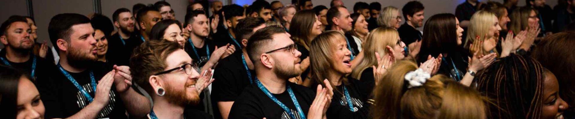 Sales-Kickoff-Attendees-Engaging-In-Event