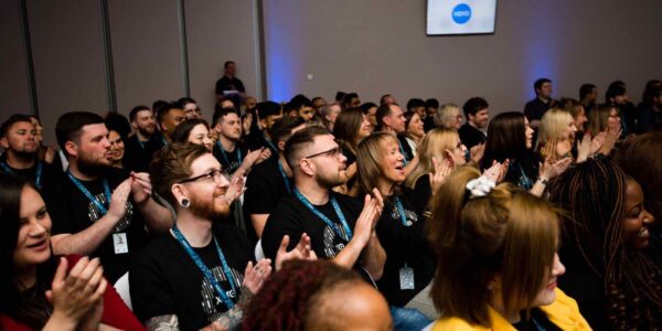 Sales-Kickoff-Attendees-Engaging-In-Event