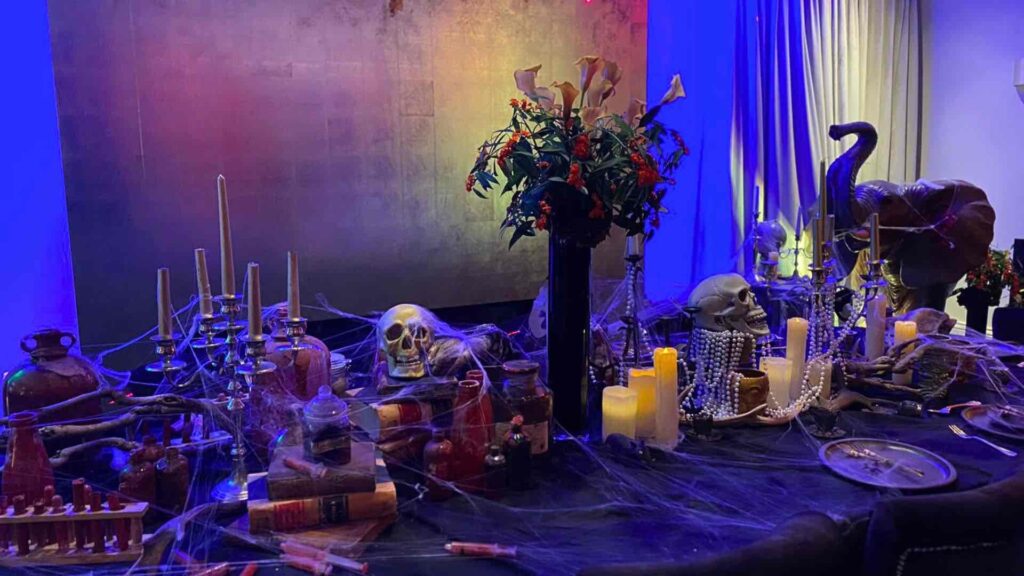 A hauntingly elegant Halloween table setting, specially designed and created for our client's Halloween party.