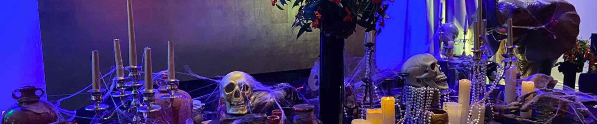 A creepy yet beautiful Halloween table setting designed and produced for our clients Halloween Party.