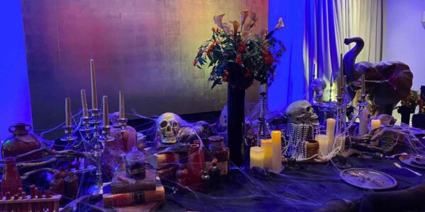 A creepy yet beautiful Halloween table setting designed and produced for our clients Halloween Party.