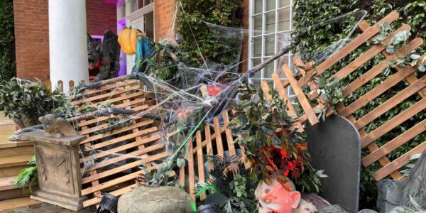 Spider Invasion halloween house decoration created for an exterior of a clients home.