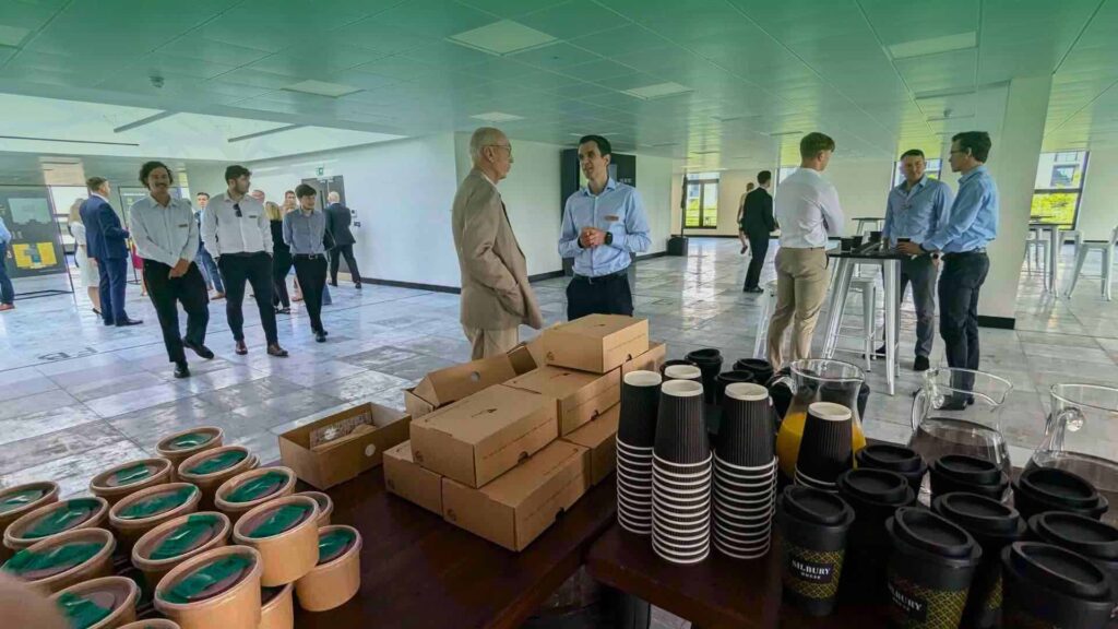 Guest enjoying sustainable event for Silbury House opening in Milton Keynes produced by sustainable event management company Julia Charles.