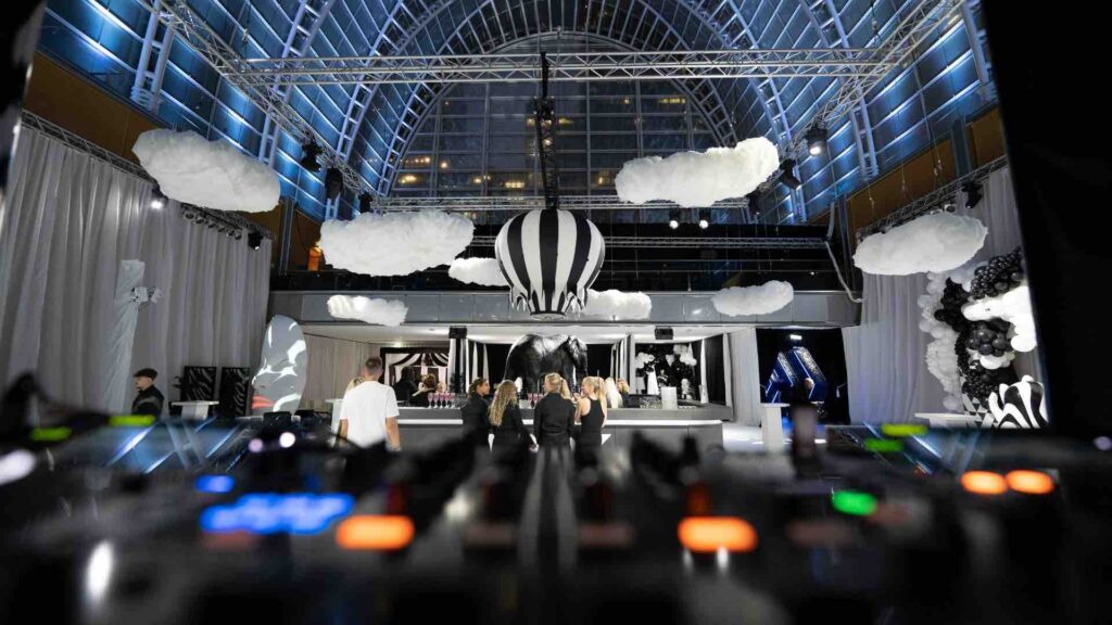 Black and white themed launch events with hot air balloon from the perspective of the DJ booth at Easter Wintergarden, an event for the Sidemens launch party.