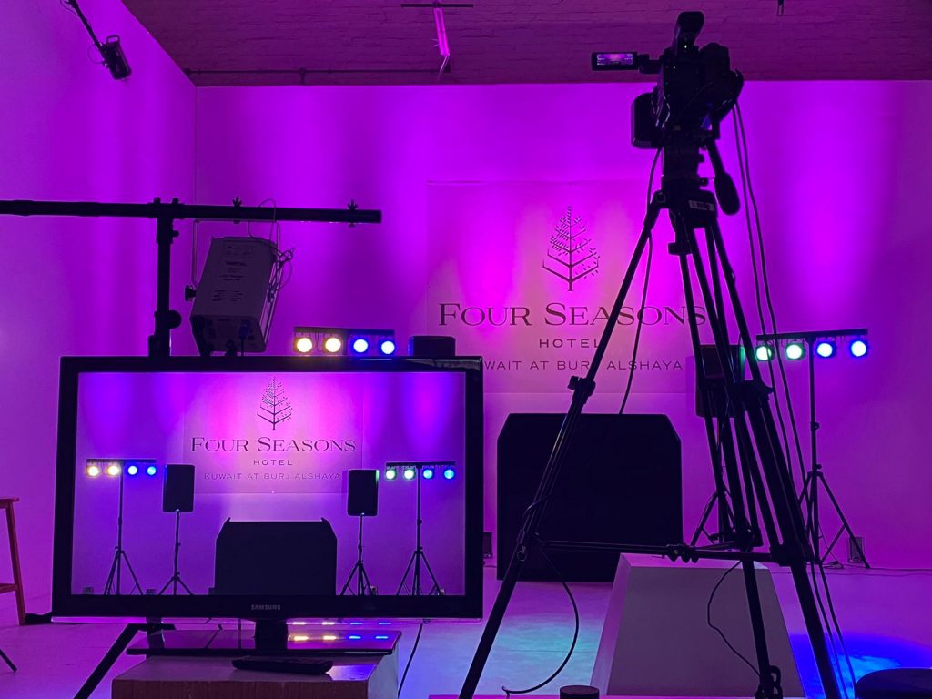 Virtual events company online event booked for corporate new years eve party using multiple different digital technology services