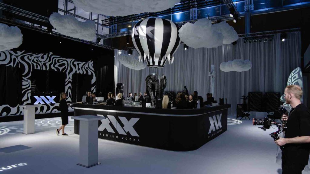 XIX unique bar design in black and white with hot air balloon created for a product launch event for sidemen at East Wintergarden.