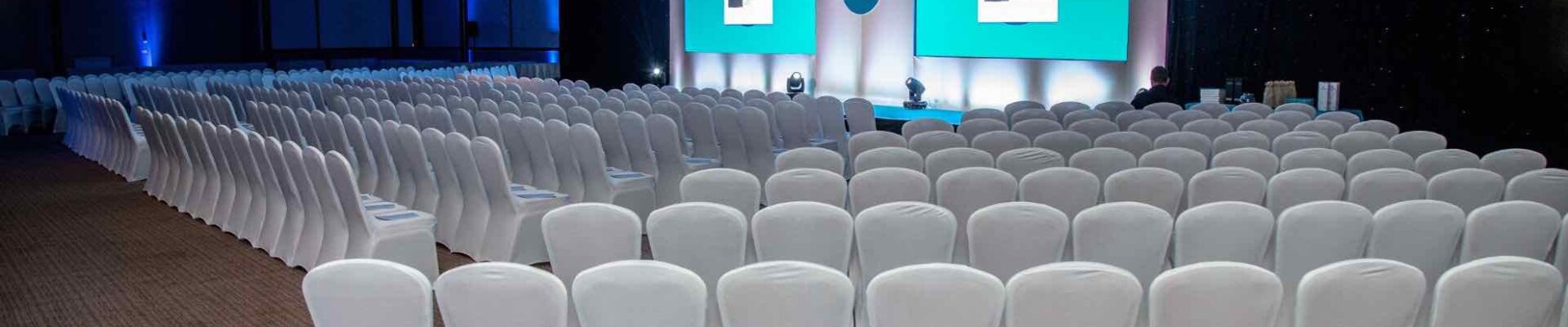 XERO corporate company set up with white chairs and staging organised at MK Stadium.