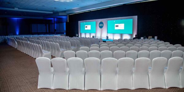 XERO corporate company set up with white chairs and staging organised at MK Stadium.