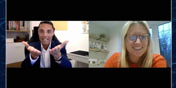 Virtual mentalist performing one-on-one virtual show with client