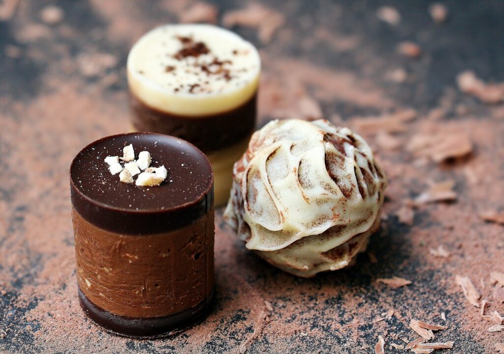 Selection of chocolates your team can make through our virtual chocolate making workshop. Book our online chocolate course today.