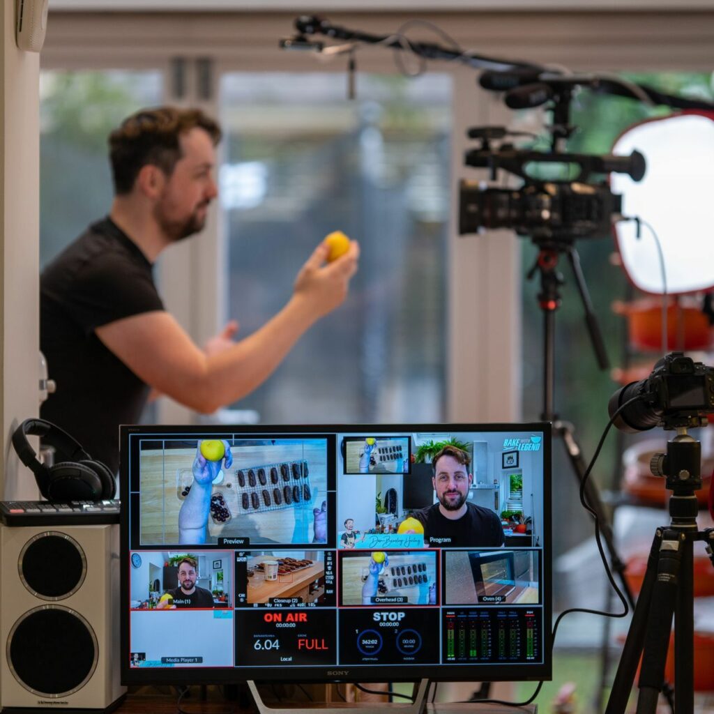GBBO star Dan filming his virtual baking workshop for a corporate team building baking workshop