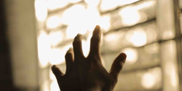 Hand-Reaching-For-Escape