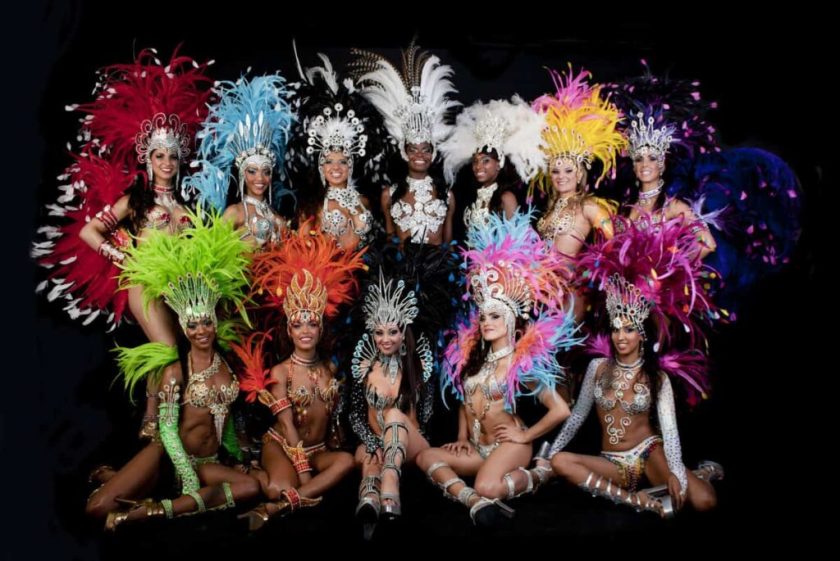 Group of brightly coloured female Brazilian carnival inspired festival dancers for hire