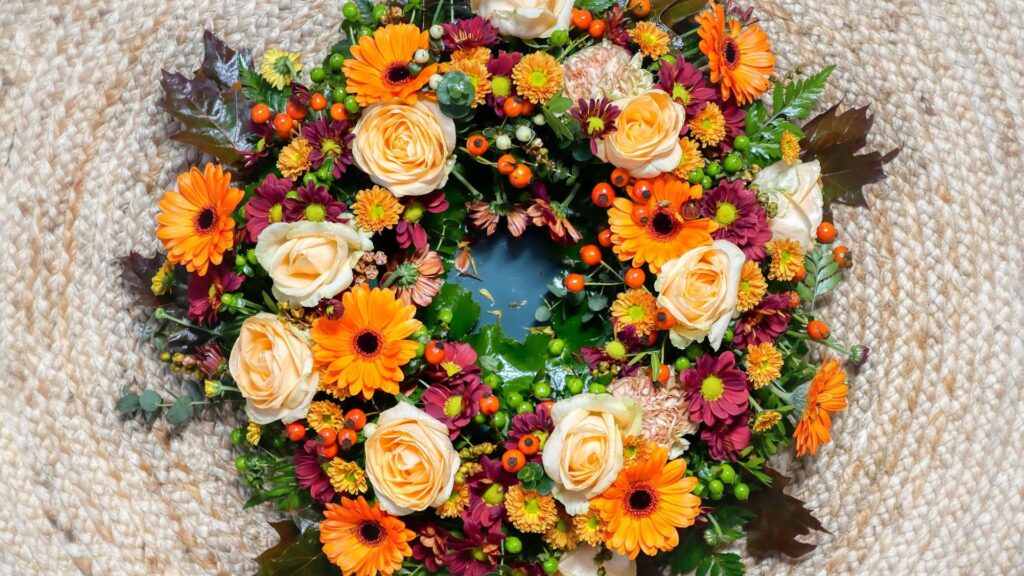 Fresh flower autumn wreath created in autumn wreath making workshop.