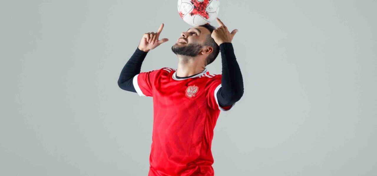 Football-Freestyler-Head-Stand