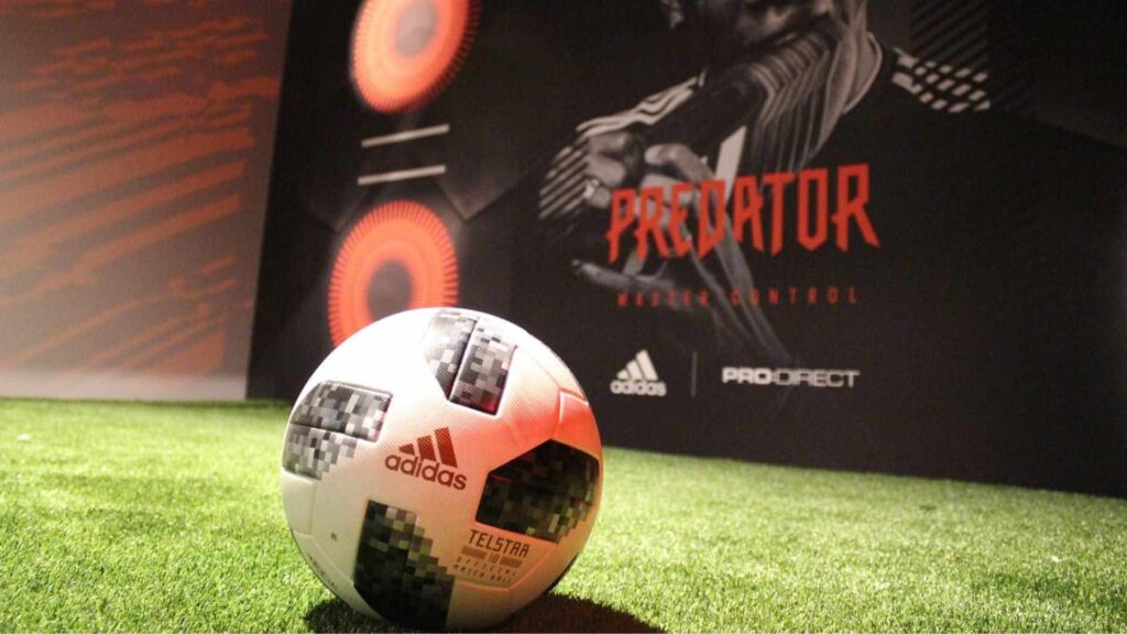 A football for a simulator sits in front of the wall