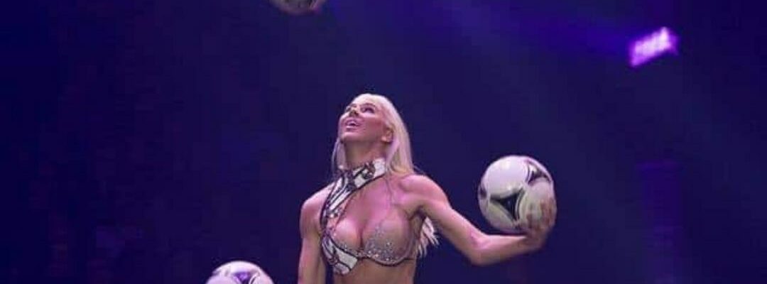 Juggling-Performer-Juggles-Footballs Juggling-Performer-Juggles-Footballs