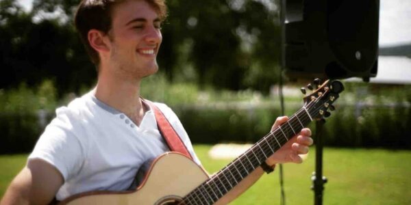 man-playing-acoustic-guitar