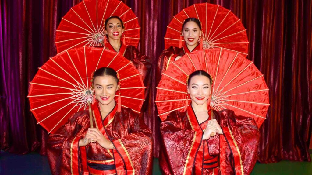 Chinese dance group holding umbrellas