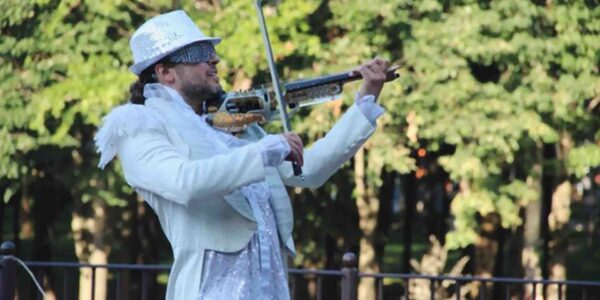 Laser-Violinist-Wearing-White-Suit