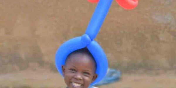 Child-Wearing-Balloon-Modeller-Creation
