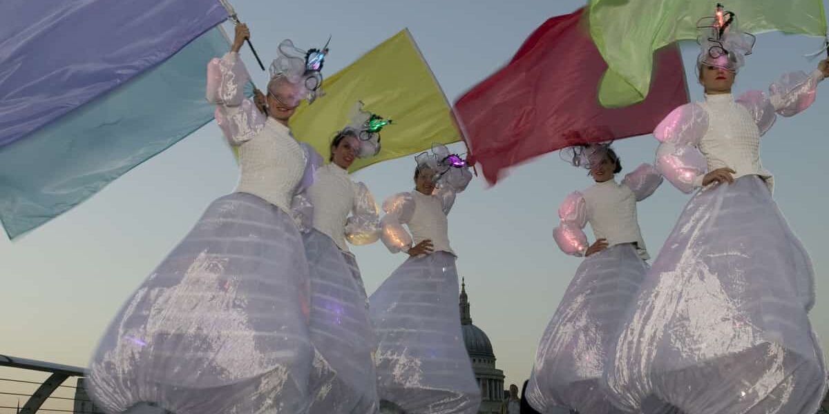 Flag-Dancers-On-Stilts