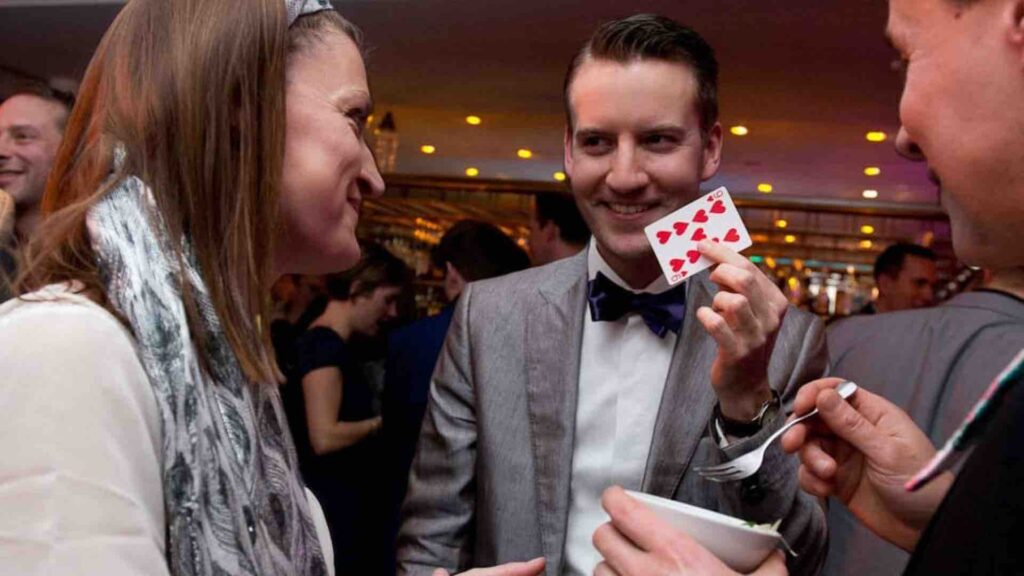 Magician entertaining guests at event