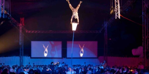 Sway-Pole-Acrobat-Balancing-On-Lantern