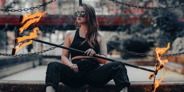 Woman-Sitting-With-Fire-Spinner