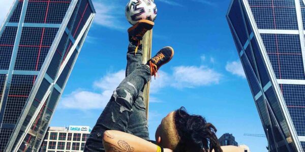 Female-Freestyler-Relaxes-With-Football