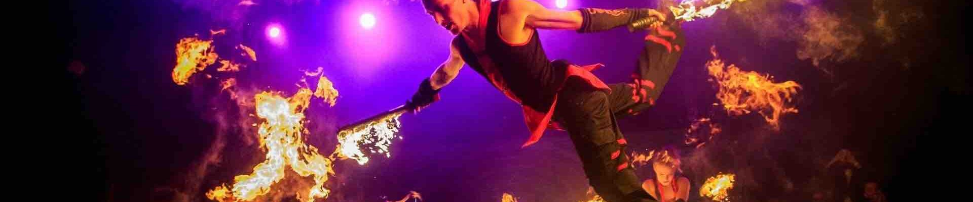Fire-Dancers-With-Flaming-Fire-Poi-Tricks