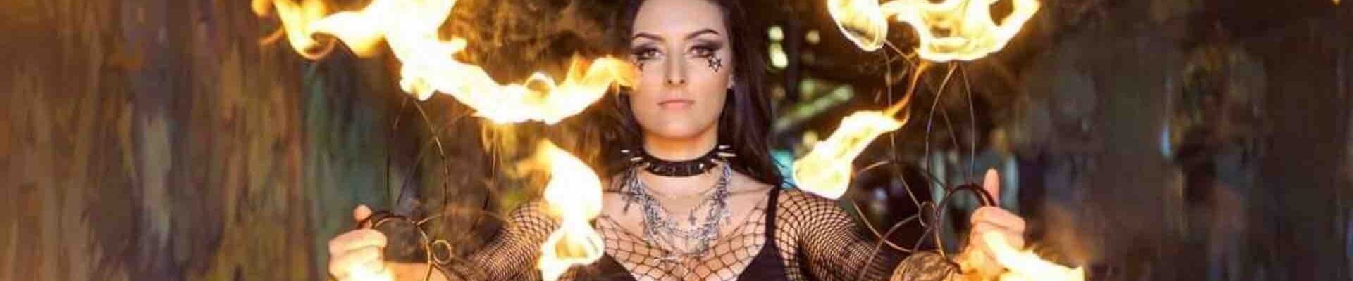 Fire-Performers-Perform-With-Fire-Fans Fire-Performers-Perform-With-Fire-Fans