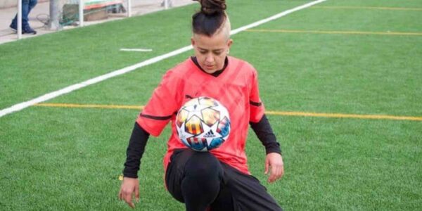 International-Football-Freestyler-Balances-Football